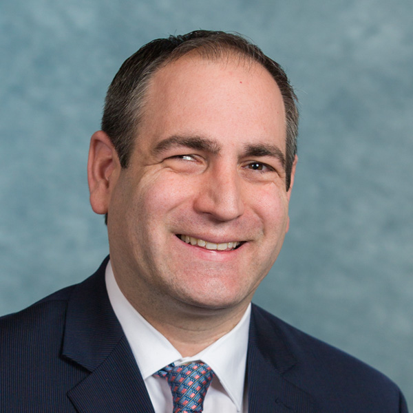 Professional headshot of David Cohen