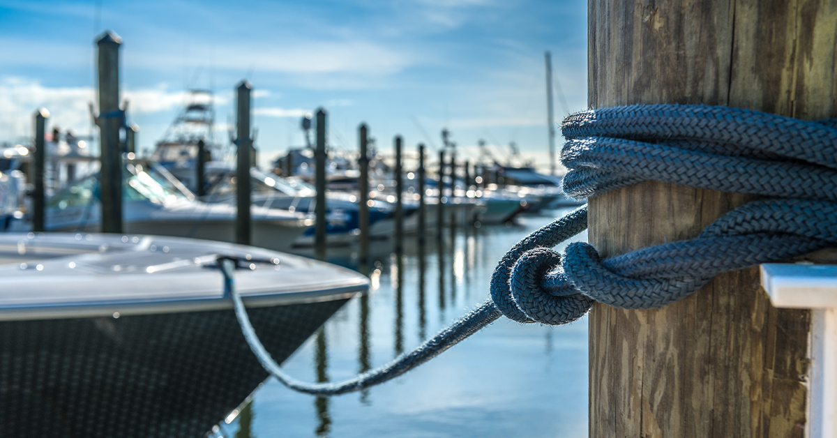 A boat tied up to a pier