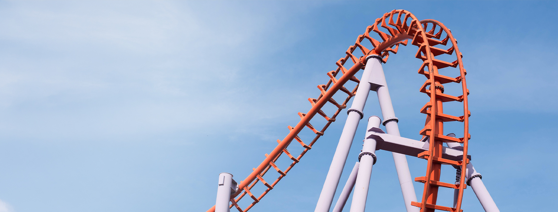 The top of a red roller coaster