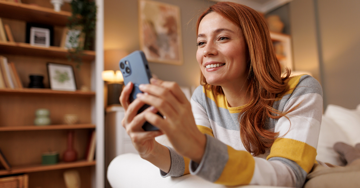 A young professional engages in mobile communication, effectively managing tasks and staying productive while on the move.